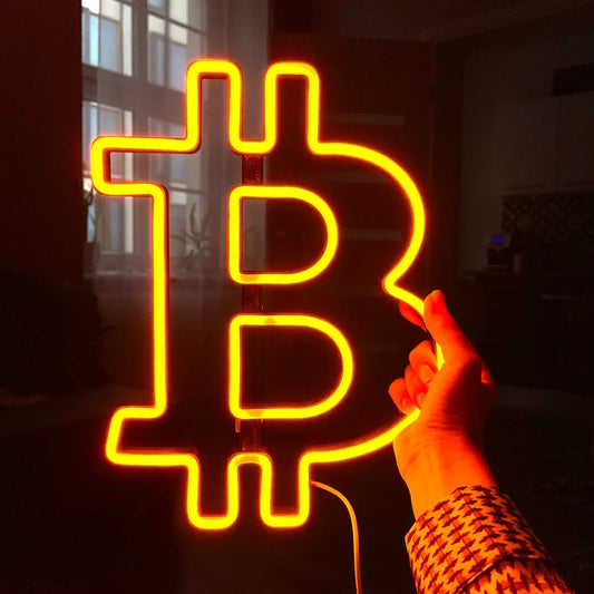 bitcoin-neon-sign-holding